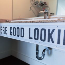 Rambler: bathroom sink with Hey There Good Looking text