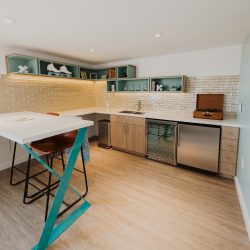 Kitchen in Rambler suite with mini fridge and bar counter