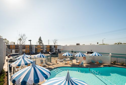 Pool at The Rambler motel with ADA accessible chair to get into the water