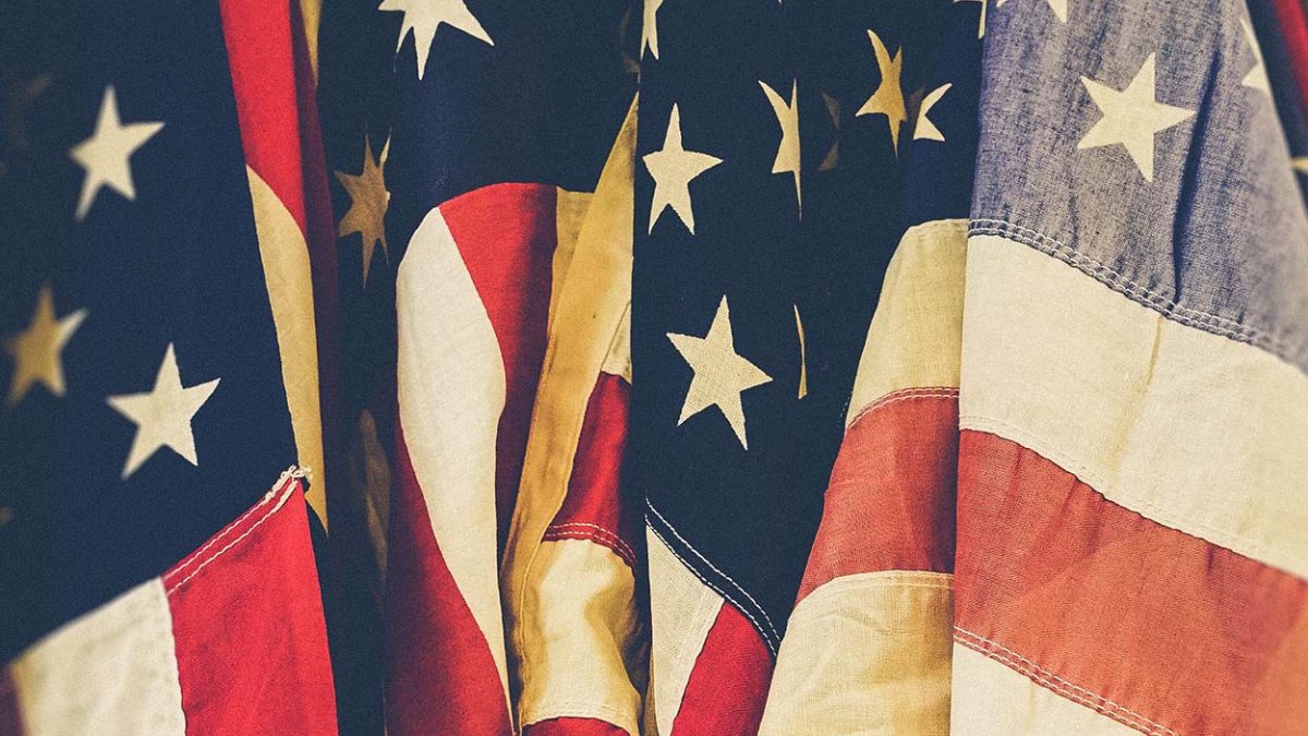 Upclose shot of vintage looking American flags