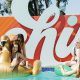 Girls on rafts floating in the Rambler pool in front of the colorful CHILL sign